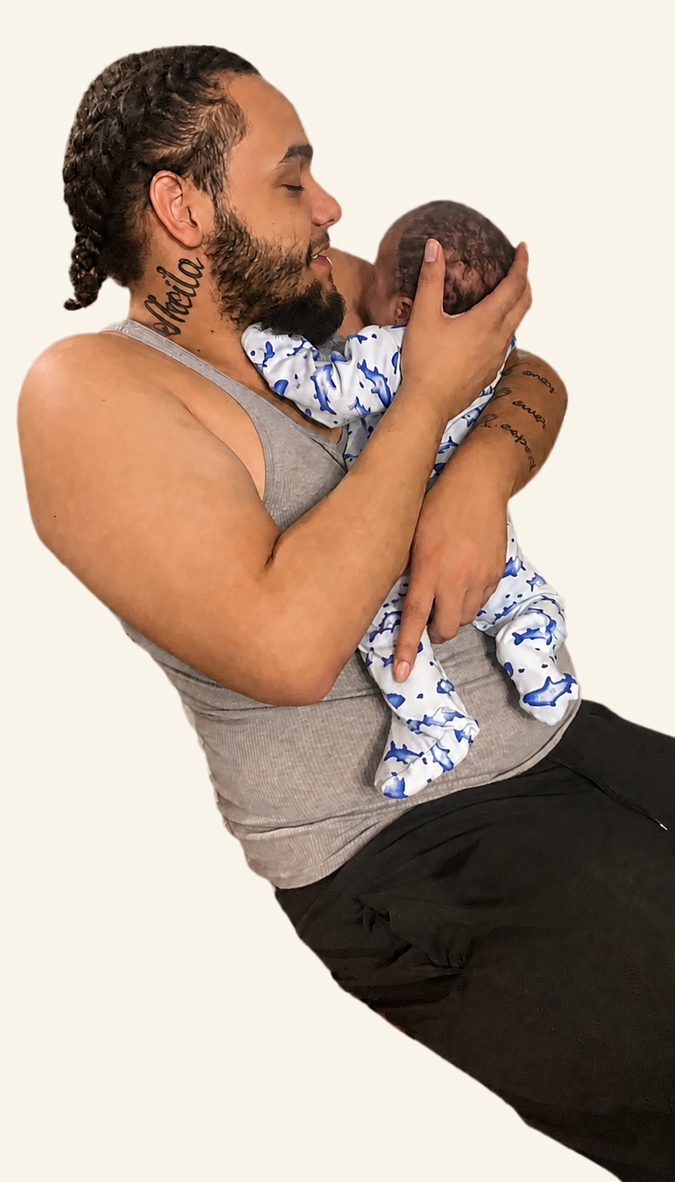Tyler holding his child close